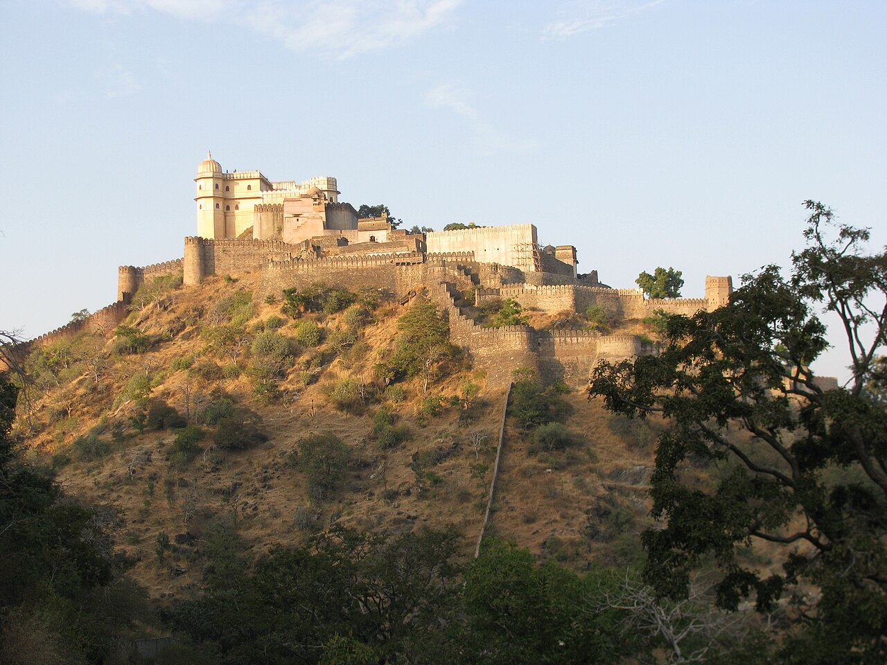 Kumbhalgarh Fort rising above its walls on a hill