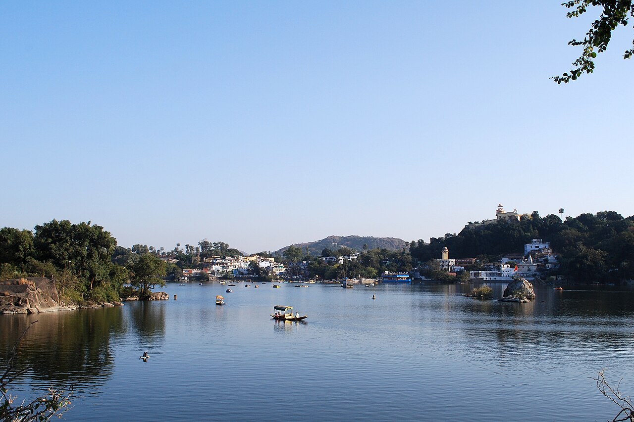 Boats on Nakki Lake with hills beyond